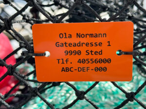 Teinemerke i plast - oransje - med trykk